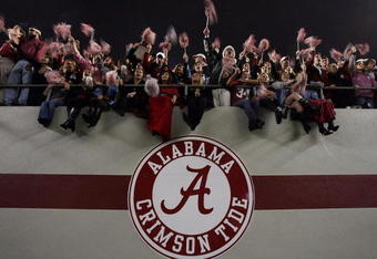 TUSCALOOSA, AL - NOVEMBER 29:  Alabama fans cheer after the Alabama Crimson Tide defeat the Auburn Tigers at Bryant-Denny Stadium on November 29, 2008 in Tuscaloosa, Alabama. Alabama defeated Auburn 36-0.  (Photo by Doug Benc/Getty Images)