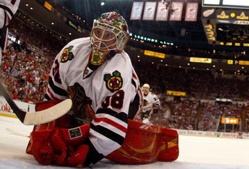 DETROIT - MAY 27:  Cristobal Huet #38 of the Chicago Blackhawks looks back behind the net against the Detroit Red Wings during Game Five of the Western Conference Championship Round of the 2009 Stanley Cup Playoffs on May 27, 2009 at Joe Louis Arena in Detroit, Michigan.  (Photo by Gregory Shamus/Getty Images)