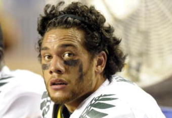 BOISE, ID - SEPTEMBER 3:  Jeremiah Masoli #8 of the Oregon Ducks watches the clock as it winds downs and the Boise State Broncos defeat Oregon 19-8 on September 3, 2009 at Bronco Stadium in Boise, Idaho. (Photo by Steve Dykes/Getty Images)
