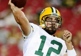 GLENDALE, AZ - AUGUST 28:  Quarterback Aaron Rodgers #12 of the Green Bay Packers warms up prior to the game against the Arizona Cardinals at the University of Phoenix Stadium on August 28, 2009 in Glendale, Arizona.  (Photo by Christian Petersen/Getty Images)