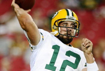 GLENDALE, AZ - AUGUST 28:  Quarterback Aaron Rodgers #12 of the Green Bay Packers warms up prior to the game against the Arizona Cardinals at the University of Phoenix Stadium on August 28, 2009 in Glendale, Arizona.  (Photo by Christian Petersen/Getty Images)