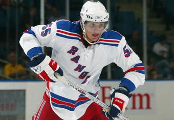 UNIONDALE, NY - SEPTEMBER 24: Artem Anisimov #55 of the New York Rangers skates against the New York Islanders during their NHL preseason game on September 24, 2007 at Nassau Coliseum in Uniondale, New York. (Photo by Jim McIsaac/Getty Images) 
