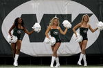 EAST RUTHERFORD, NJ - SEPTEMBER 03:  The New York Jets cheerleaders perform during the game against the Philadelphia Eagles on September 3, 2009 at Giants Stadium in East Rutherford, New Jersey. The Jets defeated the Eagles 38-27.  (Photo by Jim McIsaac/Getty Images)