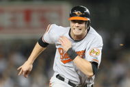 NEW YORK - MAY 21:  Nolan Reimold #14 of the Baltimore Orioles runs the bases against the New York Yankees on May 21, 2009 at Yankee Stadium in the Bronx borough of New York City.  (Photo by Nick Laham/Getty Images)