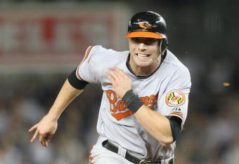 NEW YORK - MAY 21:  Nolan Reimold #14 of the Baltimore Orioles runs the bases against the New York Yankees on May 21, 2009 at Yankee Stadium in the Bronx borough of New York City.  (Photo by Nick Laham/Getty Images)