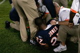 CHICAGO, IL - SEPTEMBER 3: Running back Kevin Jones #27 of the Chicago Bears lays on the sidelines as he is attended to by trainers after an injury against the Cleveland Browns at Soldier Field on September 3, 2009 in Chicago, Illinois. (Photo by Scott Boehm/Getty Images)