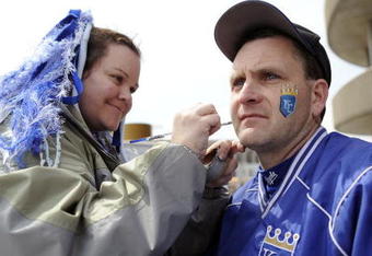 KANSAS CITY, MO - APRIL 10:  A Royals fan has face paint applied during opening day festivities at renovated Kauffman Stadium prior to the New York Yankees against the Kansas City Royals on April 10, 2009 in Kansas City, Missouri. (Photo by G. Newman Lowrance/Getty Images)