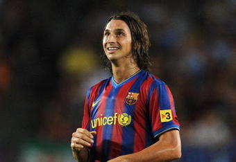 BARCELONA, SPAIN - AUGUST 31:  Zlatan Ibrahimovic   of Barcelona waits for play to resume during the La Liga match between Barcelona and Sporting Gijon at the Nou Camp stadium on August 31, 2009 in Barcelona, Spain.  (Photo by Denis Doyle/Getty Images)