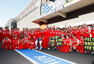 SPA FRANCORCHAMPS, BELGIUM - AUGUST 30:  Kimi Raikkonen of Finland and Ferrari celebrates with team mates in the pitlane after winning the Belgian Grand Prix at the Circuit of Spa Francorchamps on August 30, 2009 in Spa Francorchamps, Belgium.  (Photo by Mark Thompson/Getty Images)