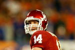 MIAMI - JANUARY 08:  Sam Bradford #14 of the Oklahoma Sooners look to pass against the Florida Gators during the FedEx BCS National Championship game at Dolphin Stadium on January 8, 2009 in Miami, Florida.  (Photo by Marc Serota/Getty Images)