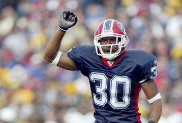 ORCHARD PARK, NY - NOVEMBER 5: Ko Simpson #30 of the Buffalo Bills celebrates on the field during the game against the Green Bay Packers on November 5, 2006 at Ralph Wilson Stadium in Orchard Park, New York. Buffalo won 24-10. (Photo by Rick Stewart/Getty Images)