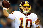 JACKSONVILLE, FL - SEPTEMBER 03:  Chase Daniel #10 of the Washington Redskins attempts a pass during the game against the Jacksonville Jaguars at Jacksonville Municipal Stadium on September 3, 2009 in Jacksonville, Florida.  (Photo by Sam Greenwood/Getty Images)