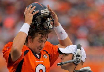 DENVER - AUGUST 30:  Head coach Josh McDaniels of the Denver Broncos talks with quarterback Kyle Orton #8 on the sidelines as they face the Chicago Bears during preseason NFL action at INVESCO Field at Mile High on August 30, 2009 in Denver, Colorado. The Bears defeated the Broncos 27-17.  (Photo by Doug Pensinger/Getty Images)
