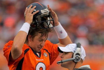 DENVER - AUGUST 30:  Head coach Josh McDaniels of the Denver Broncos talks with quarterback Kyle Orton #8 on the sidelines as they face the Chicago Bears during preseason NFL action at INVESCO Field at Mile High on August 30, 2009 in Denver, Colorado. The Bears defeated the Broncos 27-17.  (Photo by Doug Pensinger/Getty Images)