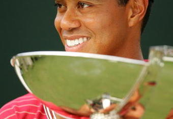 ATLANTA - SEPTEMBER 16:  Tiger Woods holds the FedEx Cup trophy after winning the TOUR Championship, the final event of the new PGA TOUR Playoffs for the FedExCup at East Lake Golf Club on September 16, 2007 in Atlanta, Georgia.  (Photo by Streeter Lecka/Getty Images)