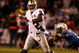 SAN DIEGO - DECEMBER 04:  Quarterback JaMarcus Russell #2 of the Oakland Raiders is grabbed by Linebacker Shaun Philips #95 of the San Diego Chargers during their NFL Game on December 4, 2008 at Qualcomm Stadium in San Diego, California.  (Photo by Harry How/Getty Images)