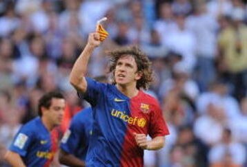 MADRID, SPAIN - MAY 02: Carles Puyol of Barcelona celebrates after scoring his team's third goal during the La Liga match between Real Madrid and Barcelona at the Santiago Bernabeu stadium on May 2, 2009 in Madrid, Spain. (Photo by Denis Doyle/Getty Images)