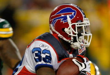GREEN BAY, WI - AUGUST 22: Running back Dominic Rhodes #33 of the Buffalo Bills runs with the football against the Green Bay Packers at Lambeau Field on August 22, 2009 in Green Bay. Wisconsin.  (Photo by Scott Boehm/Getty Images)