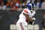 CHICAGO - AUGUST 22: Brandon Jacobs #27 of the New York Giants runs against the Chicago Bears during a pre-season game on August 22, 2009 at Soldier Field in Chicago, Illinois. The Bears defeated the Giants 17-3. (Photo by Jonathan Daniel/Getty Images)