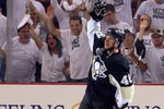 PITTSBURGH - JUNE 09:  Tyler Kennedy #48 of the Pittsburgh Penguins acknowledges the fans after a 2-1 win over the Detroit Red Wings during Game Six of the NHL Stanley Cup Finals at the Mellon Arena on June 9, 2009 in Pittsburgh, Pennsylvania.  (Photo by Jim McIsaac/Getty Images)