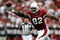 GLENDALE, AZ - JANUARY 18:  Tight end Leonard Pope #82 the Arizona Cardinals attempts to make a catch in front of linebacker Akeem Jordan #56 of the Philadelphia Eagles in the first quarter during the NFC championship game on January 18, 2009 at University of Phoenix Stadium in Glendale, Arizona.  (Photo by Jed Jacobsohn/Getty Images)