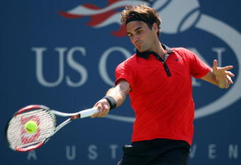 NEW YORK - SEPTEMBER 05:  Roger Federer of Switzerland returns a shot against Lleyton Hewitt of Australia during day six of the 2009 U.S. Open at the USTA Billie Jean King National Tennis Center on September 5, 2009 in the Flushing neighborhood of the Queens borough of New York City.  (Photo by Matthew Stockman/Getty Images)
