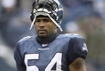 SEATTLE - DECEMBER 11:  D.D. Lewis #54 of the Seattle Seahawks stands on the field during the game with the San Francisco 49ers on December 11, 2005 at Qwest Field in Seattle, Washington. The Seahawks won 41-3. (Photo by Otto Greule Jr/Getty Images) 