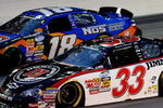 HAMPTON, GA - SEPTEMBER 05:  Kevin Harvick, driver of the #33 Jimmy John's Chevrolet races Kyle Busch, driver of the #18 NOS Energy Drink Toyota during the NASCAR Nationwide Series Degree V12 300 at Atlanta Motor Speedway on September 5, 2009 in Hampton, Georgia.  (Photo by John Harrelson/Getty Images for NASCAR)
