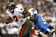 NASHVILLE, TN - AUGUST 15: William Hayes #95 of the Tennessee Titans attempts to sack Byron Leftwich #7 of the Tampa Bay Buccaneers during a preseason NFL game at LP Field on August 15, 2009 in Nashville, Tennessee. The Titans beat the Buccaneers 27-20. (Photo by Joe Murphy/Getty Images)