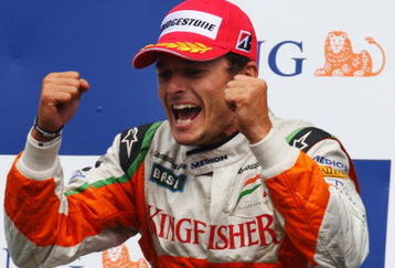 SPA FRANCORCHAMPS, BELGIUM - AUGUST 30:  Second placed Giancarlo Fisichella of Italy and Force India celebrates on the podium following the Belgian Grand Prix at the Circuit of Spa Francorchamps on August 30, 2009 in Spa Francorchamps, Belgium.  (Photo by Mark Thompson/Getty Images)