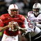RALEIGH, NC - SEPTEMBER 3:  Quarterback Russell Wilson #16 of the North Carolina State Wolfpack drops back to pass with protection by Jeraill McCuller #50 against the South Carolina Gamecocks during the game at Carter-Finley Stadium on September 3, 2009 in Raleigh, North Carolina. (Photo by Streeter Lecka/Getty Images)