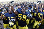 ANN ARBOR, MI - SEPTEMBER 05:  Brandon Graham #55 of the Michigan Wolverines leads his teammates in singing the schools fight song after beating the Western Michigan Broncos 31-7 on September 5, 2009 at Michigan Stadium in Ann Arbor, Michigan.  (Photo by Gregory Shamus/Getty Images)
