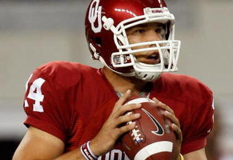 ARLINGTON, TX - SEPTEMBER 05:  Quarterback Sam Bradford #14 of the Oklahoma Sooners drops back to pass against the Brigham Young Cougars at Cowboys Stadium on September 5, 2009 in Arlington, Texas.  (Photo by Ronald Martinez/Getty Images)