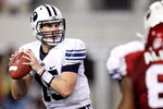 ARLINGTON, TX - SEPTEMBER 05:  Quarterback Max Hall #15 of the Brigham Young Cougars drops back to pass against the Oklahoma Sooners at Cowboys Stadium on September 5, 2009 in Arlington, Texas.  (Photo by Ronald Martinez/Getty Images)