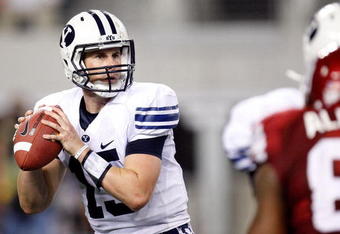 ARLINGTON, TX - SEPTEMBER 05:  Quarterback Max Hall #15 of the Brigham Young Cougars drops back to pass against the Oklahoma Sooners at Cowboys Stadium on September 5, 2009 in Arlington, Texas.  (Photo by Ronald Martinez/Getty Images)