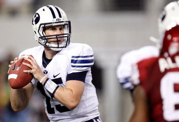 ARLINGTON, TX - SEPTEMBER 05:  Quarterback Max Hall #15 of the Brigham Young Cougars drops back to pass against the Oklahoma Sooners at Cowboys Stadium on September 5, 2009 in Arlington, Texas.  (Photo by Ronald Martinez/Getty Images)