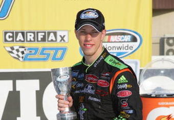 BROOKLYN, MI - AUGUST 15:  Brad Keselowski, driver of the #88 GoDaddy Chevrolet, celebrates in victory lane after winning the NASCAR Nationwide Series at Michigan International Speedway on August 15, 2009 in Brooklyn, Michigan.  (Photo by Jerry Markland/Getty Images for NASCAR)