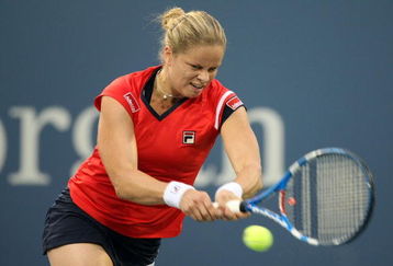 NEW YORK - SEPTEMBER 04:  Kim Clijster of Belgium returns a shot against Kirsten Flipkens of Belgium during day five of the 2009 U.S. Open at the USTA Billie Jean King National Tennis Center on September 4, 2009 in the Flushing neighborhood of the Queens borough of New York City.  (Photo by Al Bello/Getty Images)