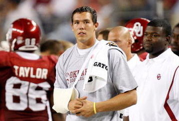 ARLINGTON, TX - SEPTEMBER 05:  Quarterback Sam Bradford #14 of the Oklahoma Sooners stands on the sidelines after suffering an injury against the Brigham Young Cougars at Cowboys Stadium on September 5, 2009 in Arlington, Texas.  (Photo by Ronald Martinez/Getty Images)