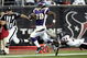 HOUSTON - AUGUST 31:  Running back Adrian Peterson #28 scores on a 75 yard run as strong safety Dominique Barber #34 of the Houston Texans makes a diving attempt to make the tackle at Reliant Stadium on August 31, 2009 in Houston, Texas.  (Photo by Bob Levey/Getty Images)