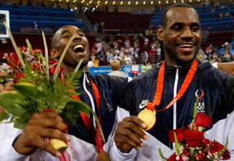 BEIJING - AUGUST 24:  Kobe Bryant #10 (L) and LeBron James #6 of the United States celebrate during the medal ceremony after defeating Spain 118-107  in the gold medal game during Day 16 of the Beijing 2008 Olympic Games at the Beijing Olympic Basketball Gymnasium on August 24, 2008 in Beijing, China.  (Photo by Streeter Lecka/Getty Images)