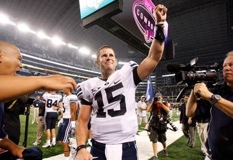 ARLINGTON, TX - SEPTEMBER 05:  Quarterback Max Hall #15 of the Brigham Young Cougars celebrates a 14-13 win against the Oklahoma Sooners at Cowboys Stadium on September 5, 2009 in Arlington, Texas.  (Photo by Ronald Martinez/Getty Images)