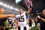 ARLINGTON, TX - SEPTEMBER 05:  Quarterback Max Hall #15 of the Brigham Young Cougars celebrates a 14-13 win against the Oklahoma Sooners at Cowboys Stadium on September 5, 2009 in Arlington, Texas.  (Photo by Ronald Martinez/Getty Images)