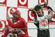 MONZA, ITALY - SEPTEMBER 12:  Jenson Button of Great Britain and B.A.R soaks Rubens Barichello of Brazil with champagne after he won the Italian F1 Grand Prix at the Autodromo Nazionale di Monza Circuit on September 12, 2004, in Monza, Italy. (Photo by Mark Thompson/Getty Images) 