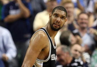 DALLAS - APRIL 25:  Forward Tim Duncan #21 of the San Antonio Spurs in Game Four of the Western Conference Quarterfinals during the 2009 NBA Playoffs at American Airlines Center on April 25, 2009 in Dallas, Texas. NOTE TO USER: User expressly acknowledges and agrees that, by downloading and or using this photograph, User is consenting to the terms and conditions of the Getty Images License Agreement.  (Photo by Ronald Martinez/Getty Images)