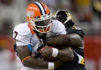 ST. LOUIS, MO - AUGUST 30: Juice Williams #7 of the University of Illinois Fighting Illini is sacked against the University of Missouri Tigers during the State Farm Arch Rivalry game at the Edward Jones Dome on August 30, 2008 in St. Louis, Missouri.  The Tigers beat the Fighting Illini 52-42.  (Photo by Dilip Vishwanat/Getty Images)