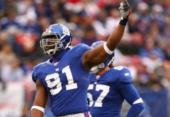 EAST RUTHERFORD, NJ - NOVEMBER 16:  Justin Tuck #91 of the New York Giants of the Baltimore Ravens during their game on November 16, 2008 at Giants Stadium in East Rutherford, New Jersey.  (Photo by Al Bello/Getty Images)