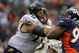 DENVER - OCTOBER 12:  Offensive tackle Tony Pashos #79 of the Jacksonville Jaguars blocks the rush defensive end Tim Crowder #96 of the Denver Broncos during NFL action at Invesco Field at Mile High on October 12, 2008 in Denver, Colorado. The Jaguars defeated the Broncos 24-17.  (Photo by Doug Pensinger/Getty Images)