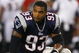 FOXBORO, MA - AUGUST 7: Richard Seymour #93 of the New England Patriots looks on while resting on his right knee against the Baltimore Ravens during the preseason game at Gillette Stadium on August 7, 2008 in Foxboro, Massachusetts. (Photo by Jim Rogash/Getty Images)