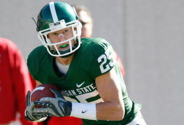 EAST LANSING - NOVEMBER 1:  Blair White #25 of the Michigan State Spartans carries the ball during the game against the Wisconsin Badgers at Spartan Stadium on November 1, 2008 in East Lansing, Michigan. (Photo by: Gregory Shamus/Getty Images)